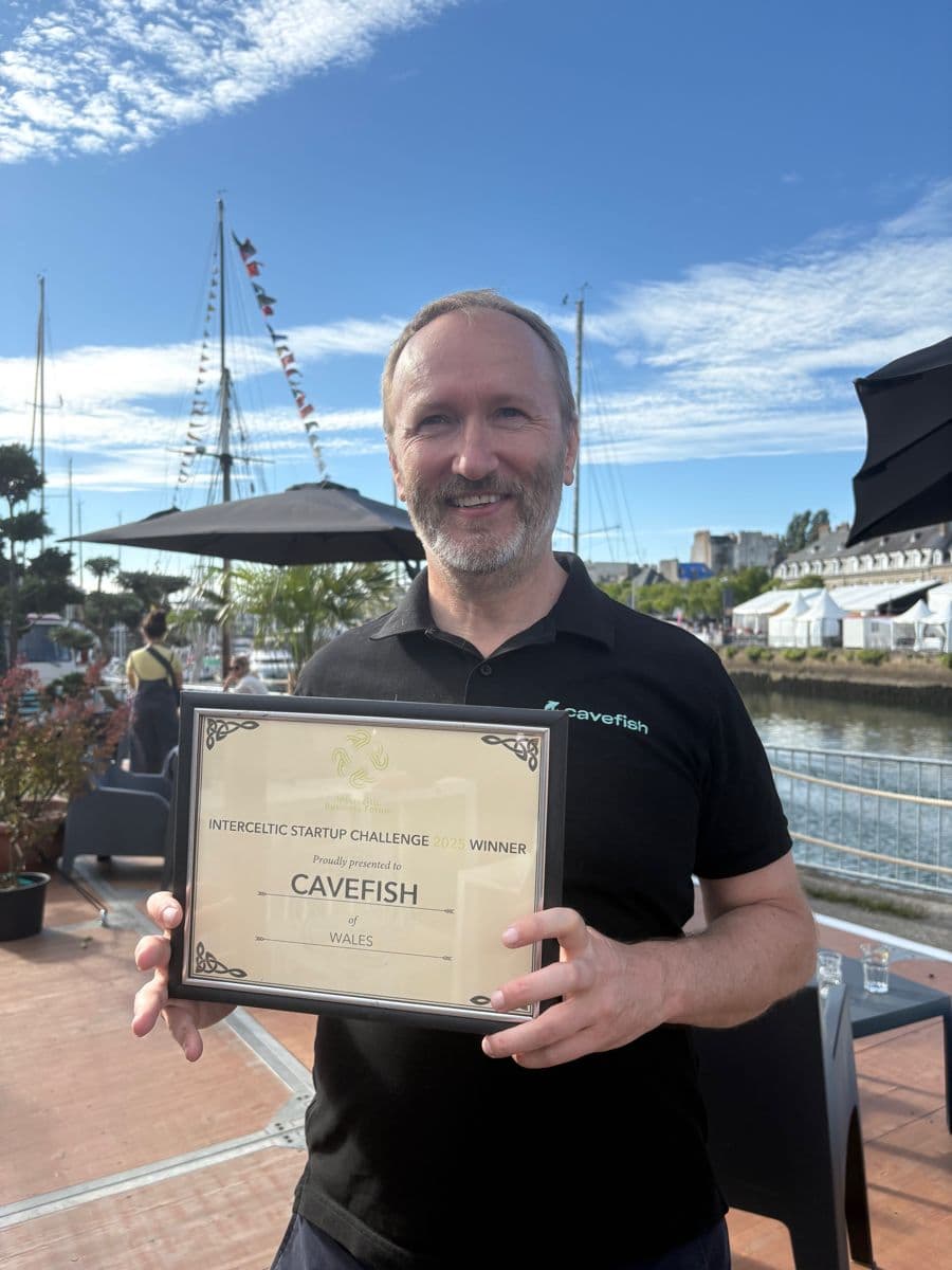 Jonathan Prescott holding the Interceltic Startup Challenge winner certificate