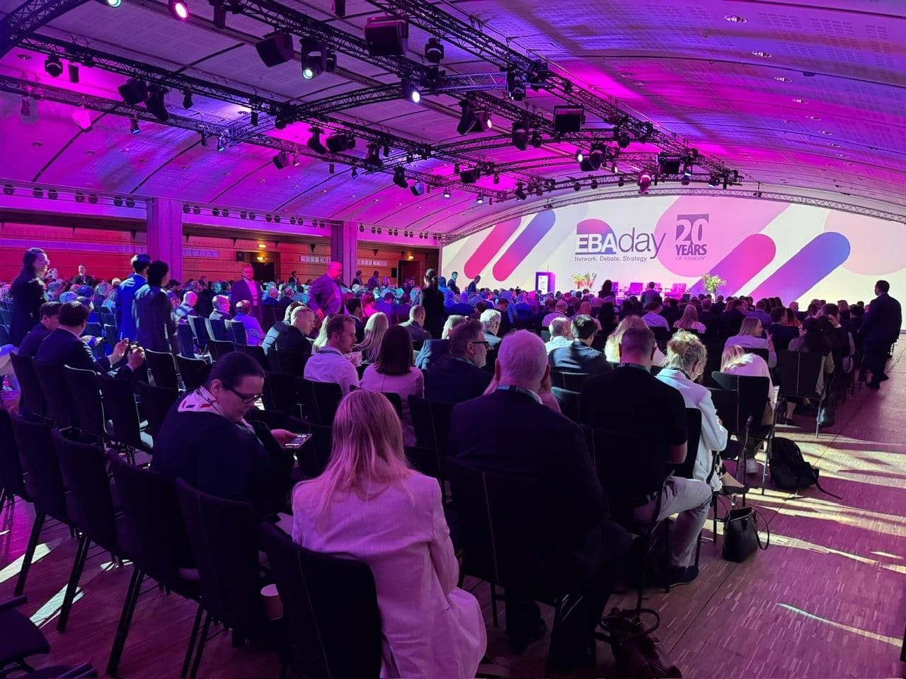 A large conference audience facing the stage at EBAday