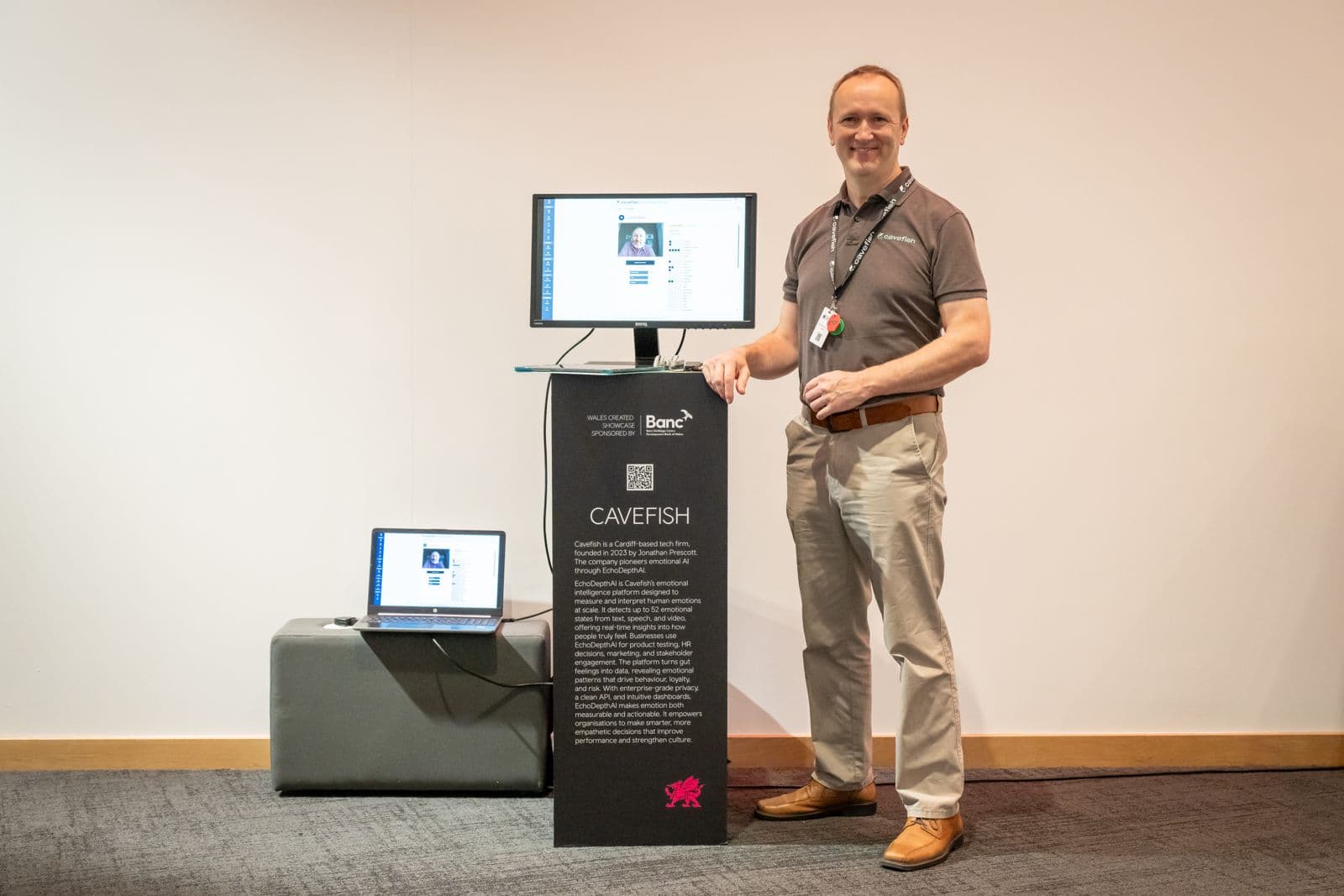 Jonathan Prescott beside a Cavefish kiosk at the Wales Investment Summit